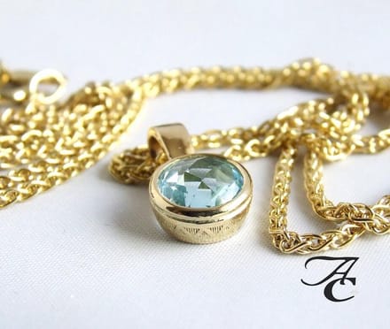 Gouden ketting en zirkonia harten sleutelhanger