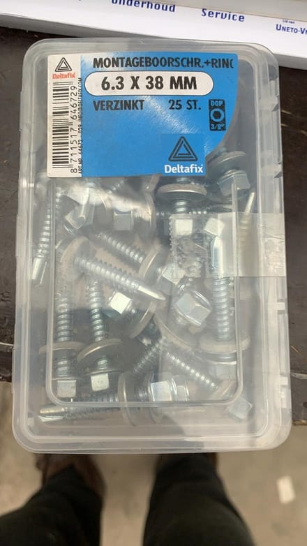 Montageboorschroef + ring 6.3x38mm verzinkt 25stuks. DeltafiX.