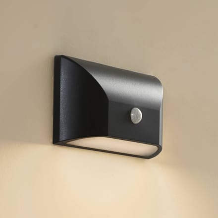 Lindby LED buiten wandlamp Siana, zwart, PC, sensor