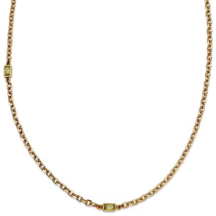 Prism | Vergulde ketting met peridotgroene stenen van kristalglas en 2 schakels
