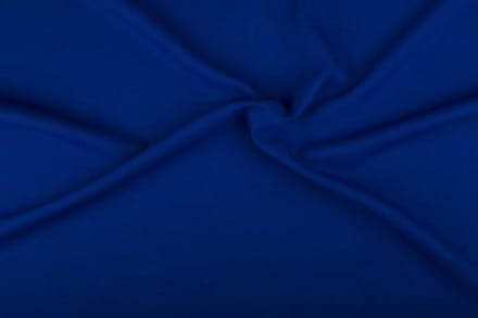 Texture/polyester stof - Blauw - 25 meter