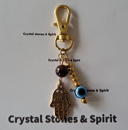 Boze Oog / Khamsa met "Granaat" , sleutelhanger goudkleurig