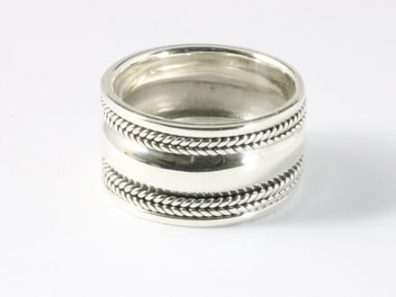 Brede hoogglans zilveren ring met kabelpatronen - 11 mm. - maat 21