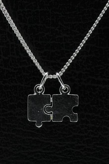 Zilveren Puzzelstuk ketting hanger - klein