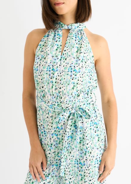 Blauwe jumpsuit met bloemenprint en halternek