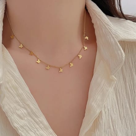 Vlindertjes ketting goud gekleurd