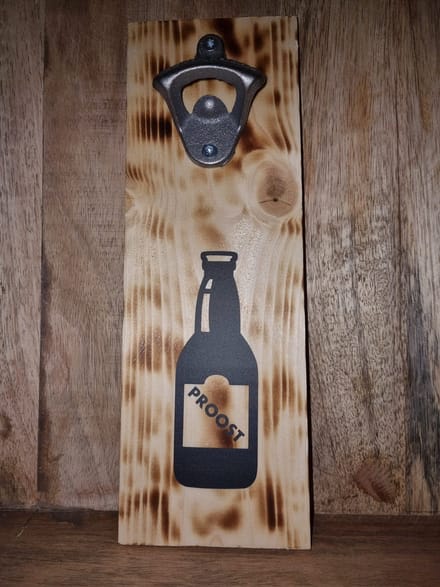 Wand flesopener flesje proost