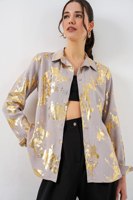 Oversized gestreepte blouse met knopen