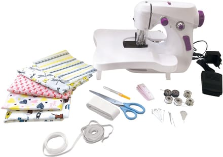 L’Atelier de Couture - Machine à coudre lumineuse