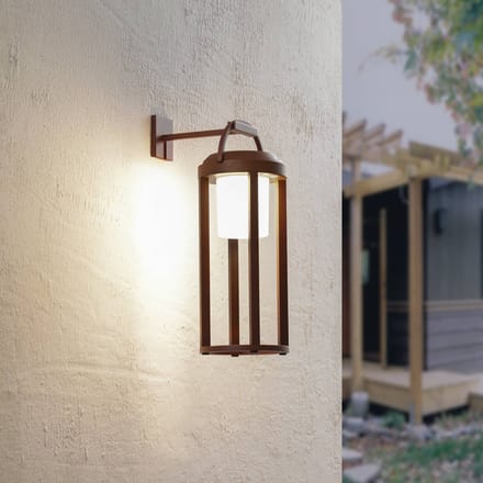 Lucande 2-in-1 LED-wandlamp op zonne-energie Tilena, roestkleur, rond, aluminium