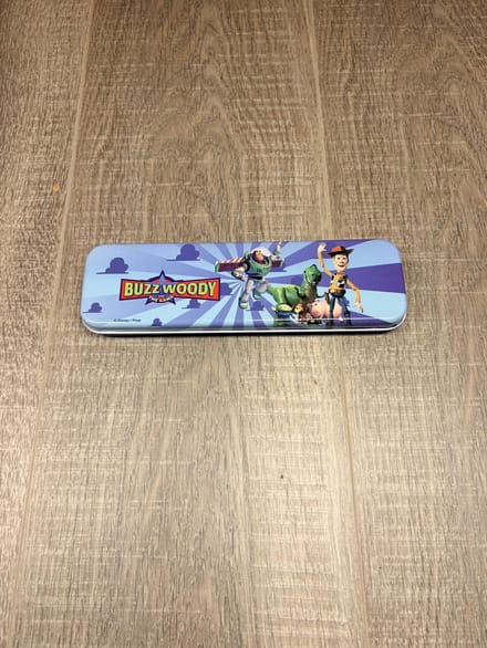 Disney Pixar Toy Story Pennendoos Metaal – Buzz Lightyear & Woody – 20 cm