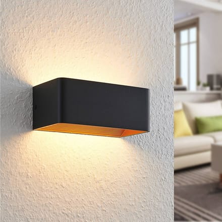 Arcchio LED wandlamp Karam, 20 cm, zwart, metaal, omhoog/omlaag