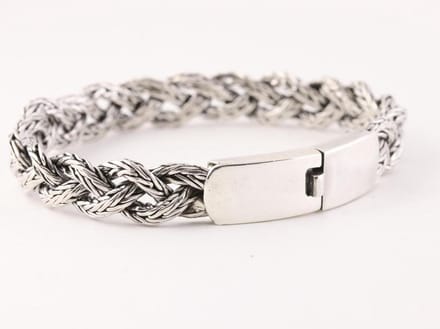 Zware gevlochten zilveren armband met kliksluiting - lengte 19 cm