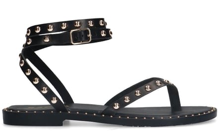 Sacha - Dames - Zwarte leren platte sandalen met goudkleurige studs - Maat 38