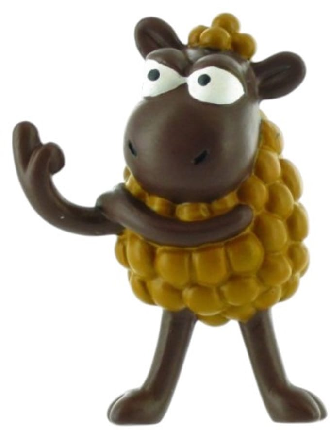 Beelorcia Beltza - Kukuxumusu Figuur bruin schaap in power houding - 7 cm