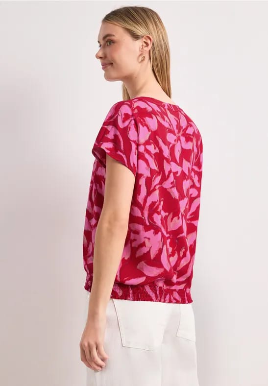 Blouseshirt met gespleten hals en smokdetail