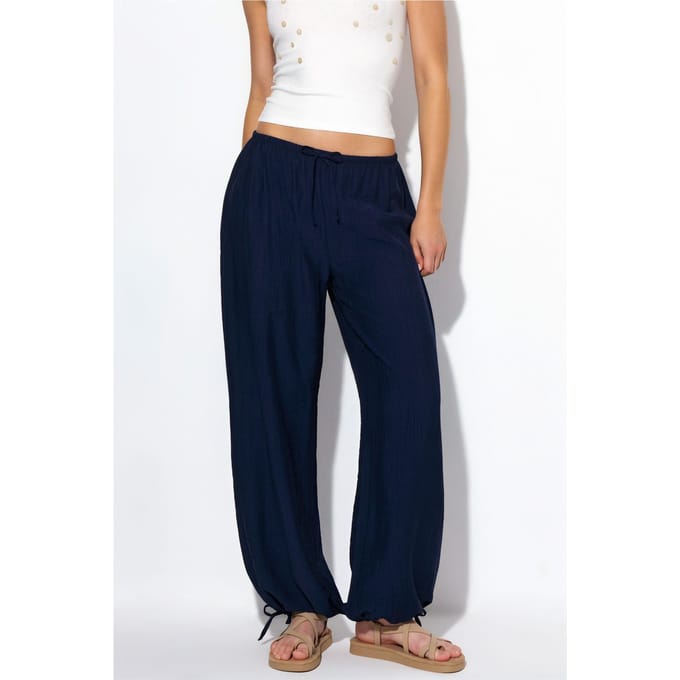 Elastische broek met strikdetail