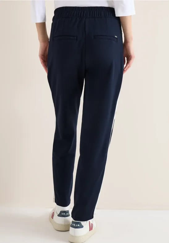 Broek met colour block tape