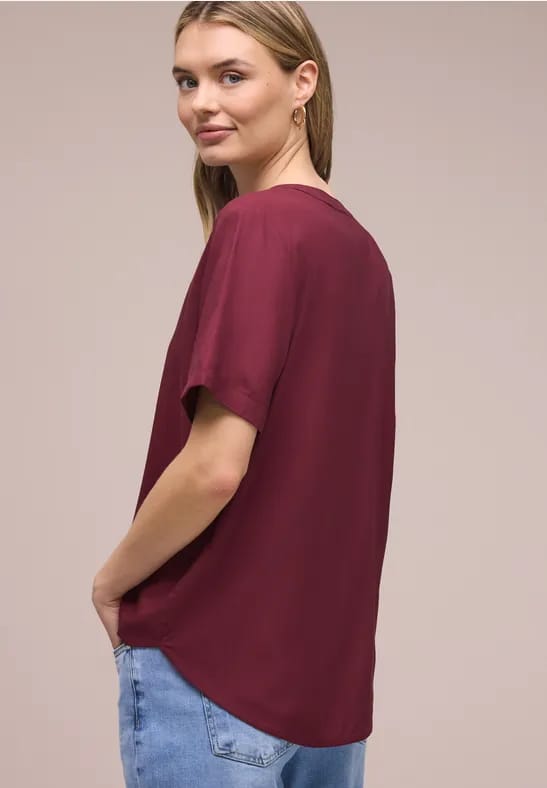 Blouse met gespleten hals en omslag