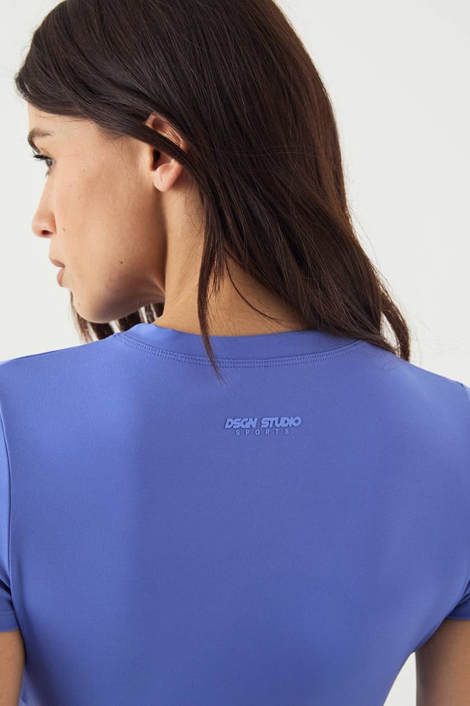 Dames DSGN Studio Ultra Sculpt Korte Mouw Top | Cornflower | Maat: XS