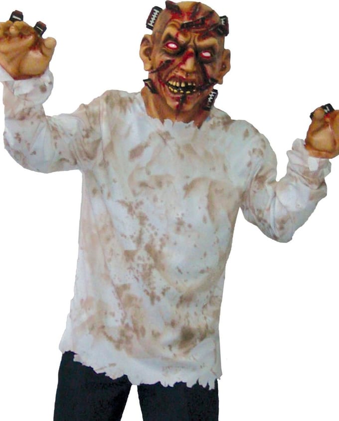Zombie kostuum scheermesjes door hoofd