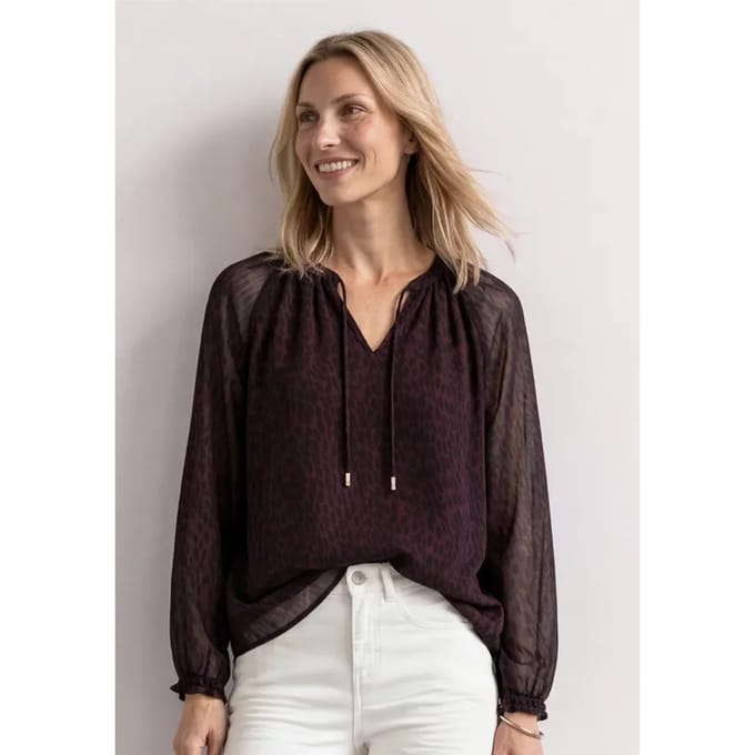 Raglanblouse met split in de hals en print