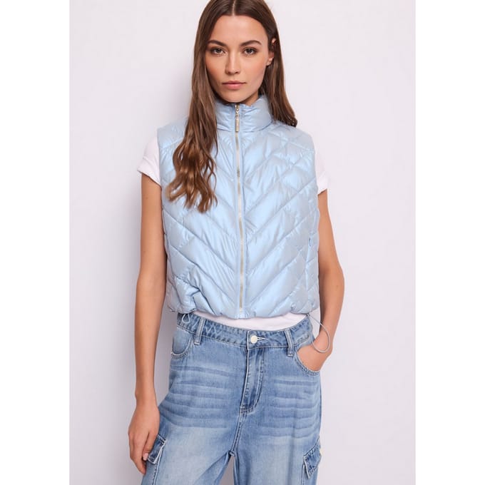 blauw lucht gewatteerde vest