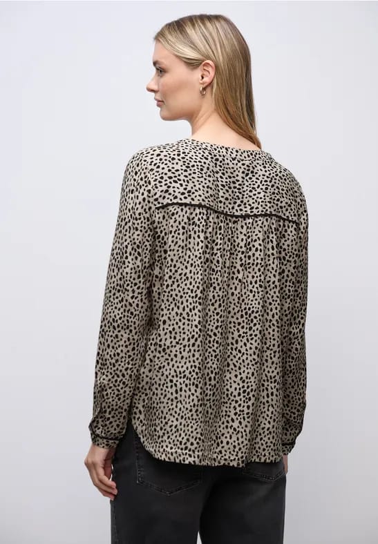 Leo blouse met taping details