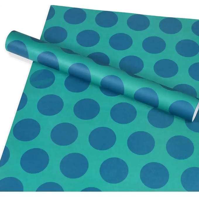 Cadeaupapier met blauwe stippen op turquoise Rex London