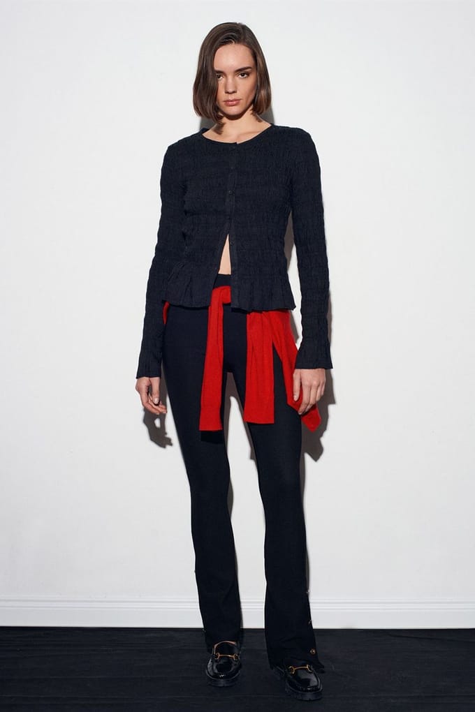 Textuur gebreide blouse met knopen aan de voorkant