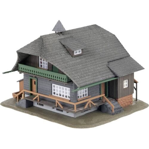 Faller 130010 H0 Jubiläummodel Schwarzwaldhaus met figuur