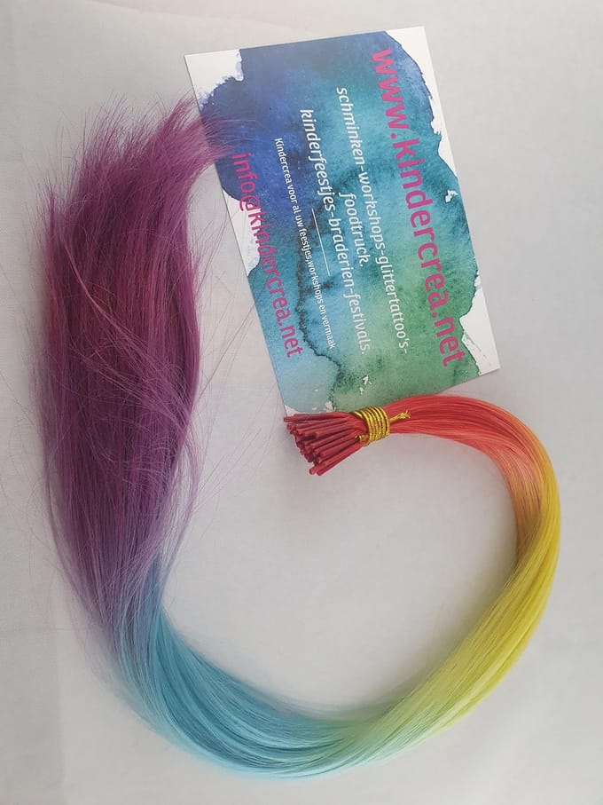 haar extension regenboog rood-geel-blauw-paars  55 cm  50 stuks