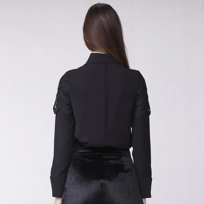 Geschulpte rand kanten shirt