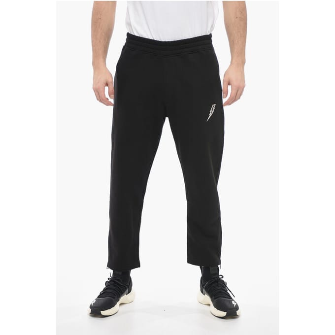 Losse joggingbroek van katoenmix met enkelrits in zwart