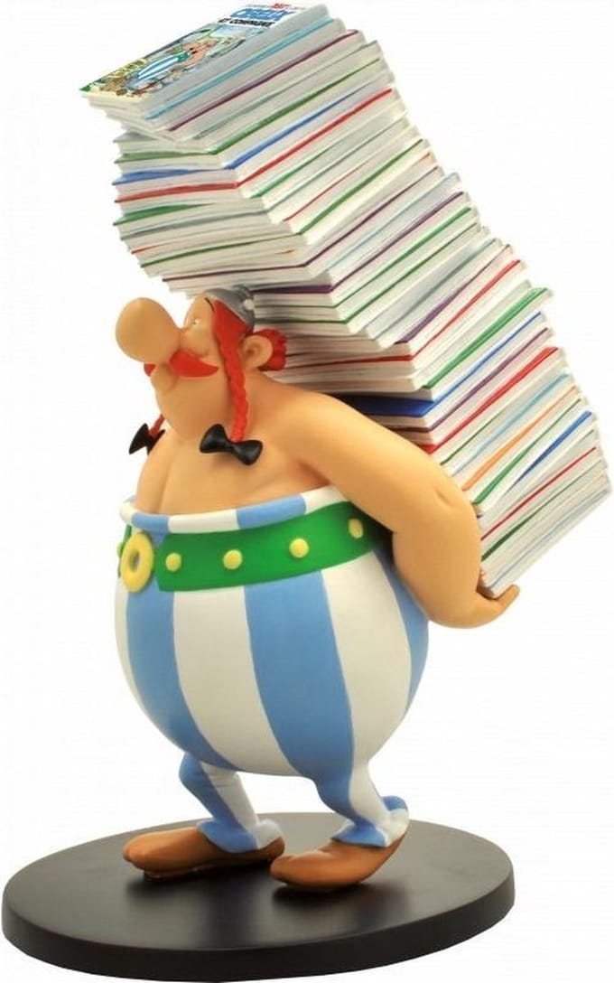 Plastoy - OBELIX PILE OF COMICS COLLECTIBLE FIGURINE - Figuur
