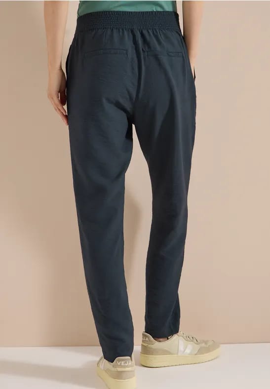 Mid Waist Slim Legs broek in Loose Fit