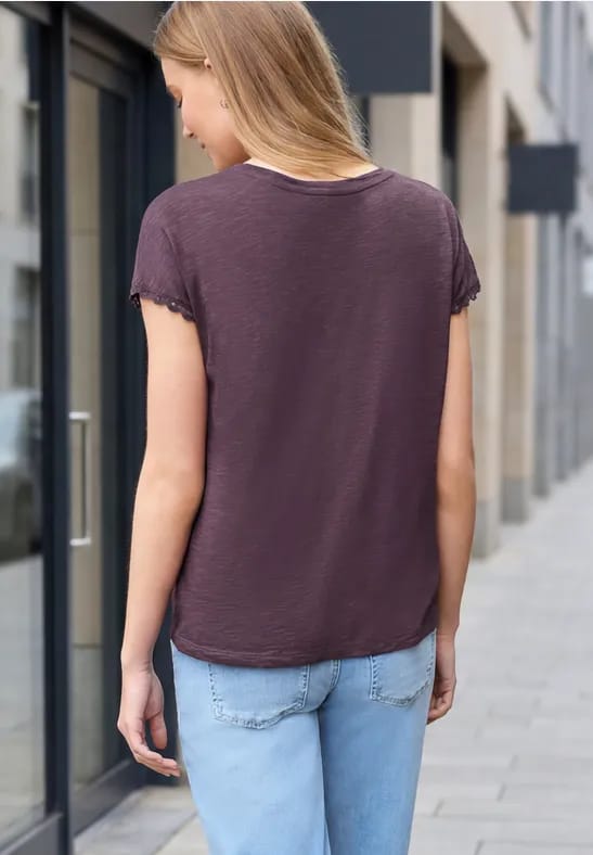 Shirt met overhangende schouder en decoratieve tape
