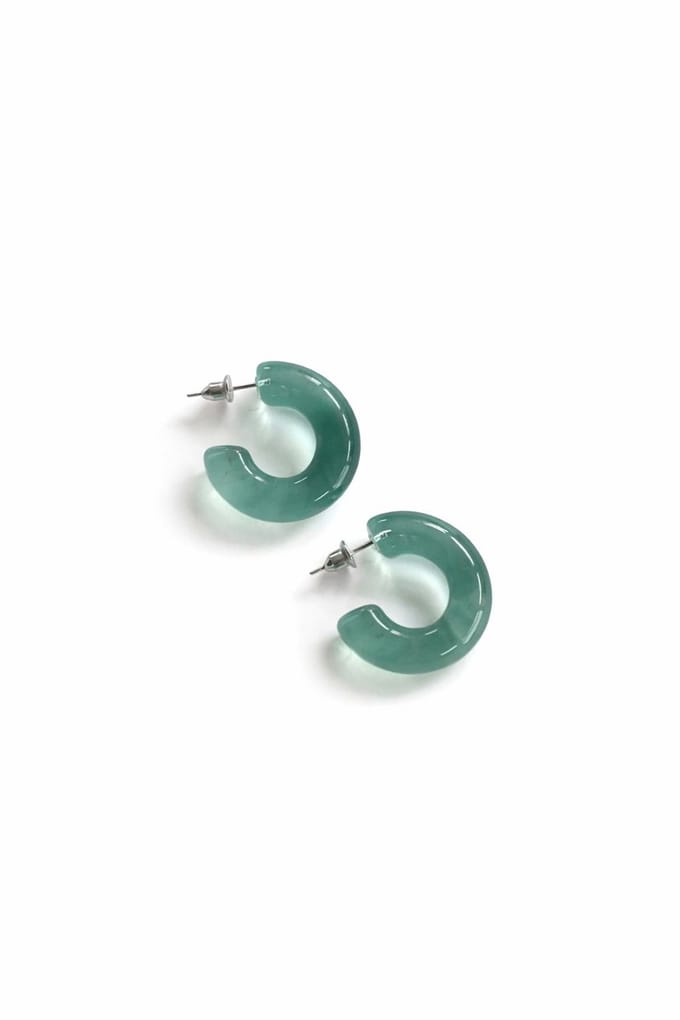 Doorschijnende turquoise oorringen
