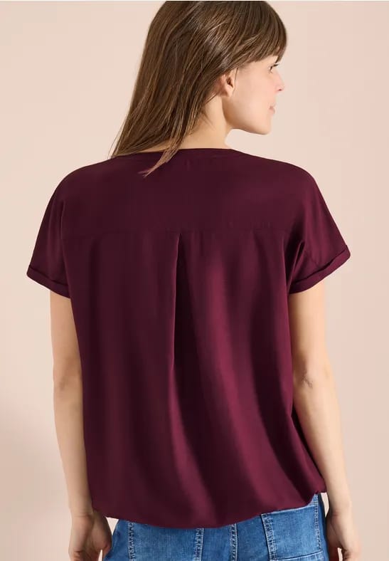 Blouse met korte mouwen en gespleten hals