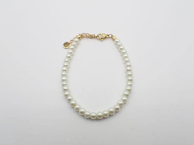 Colure® armband glasparels 6mm off-white goud