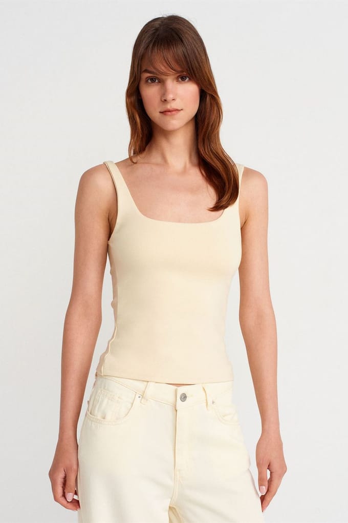 Geribbeld vierkant decolleté mouwloos blouse