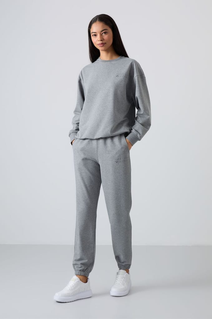 Oversized sweatshirt en set met elastische boordbroek