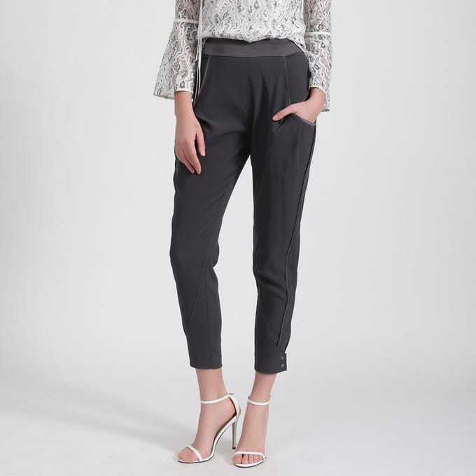 Bi-materiaal taps toelopende broek