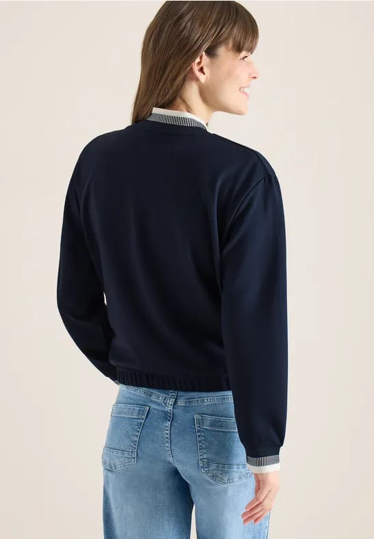 Jersey blouson met contrasterende knoopdetails