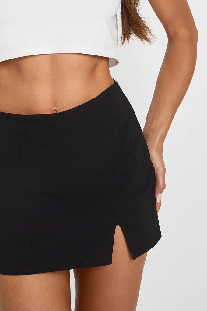 boohoo Dames Mini-skort met split aan de voorkant | Zwart | Maat: 34