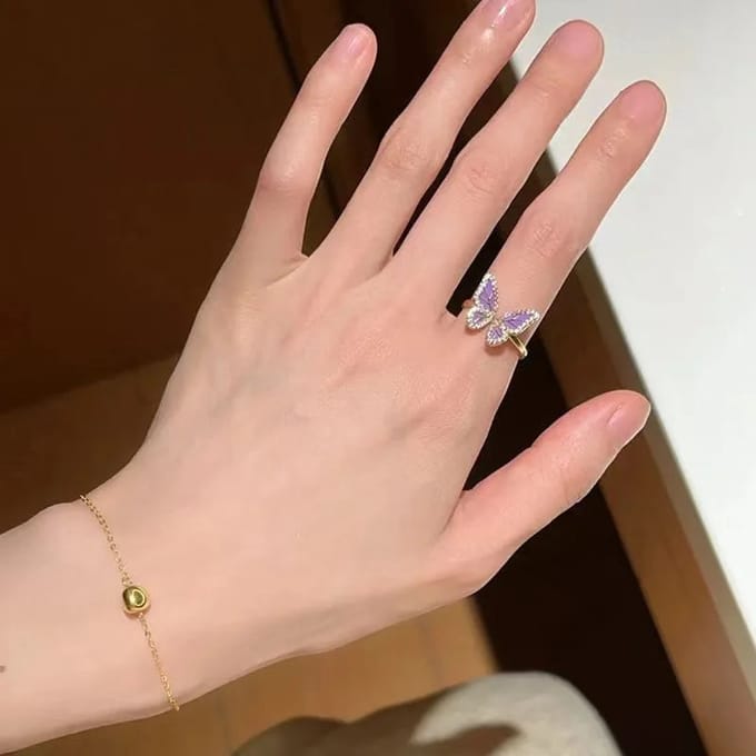 Vlinder ring | paars | goud gekleurd