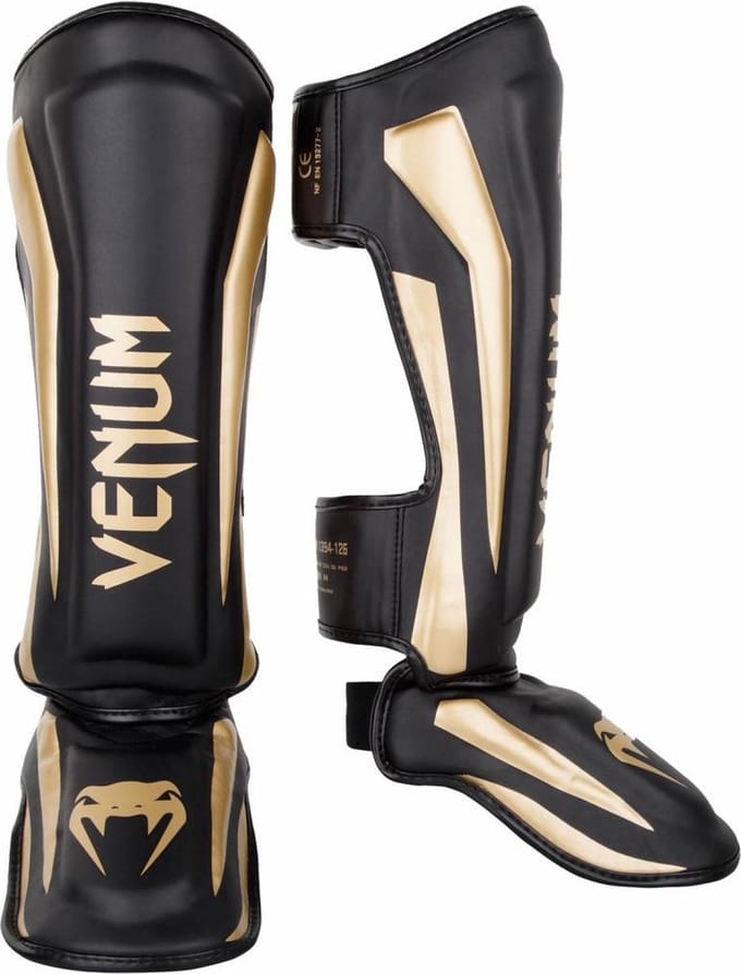 Venum Kickboks Scheenbeschermers Elite Zwart Goud - XL