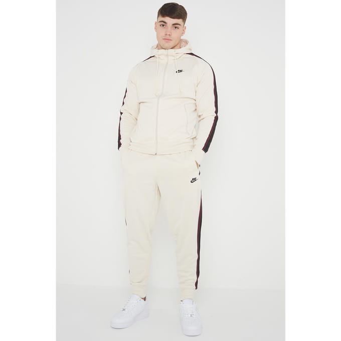 Nike Tribute poly trainingspak voor heren in crème