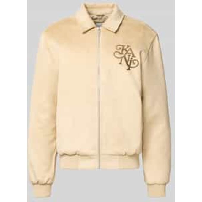 Jack in leerlook met labelstitching