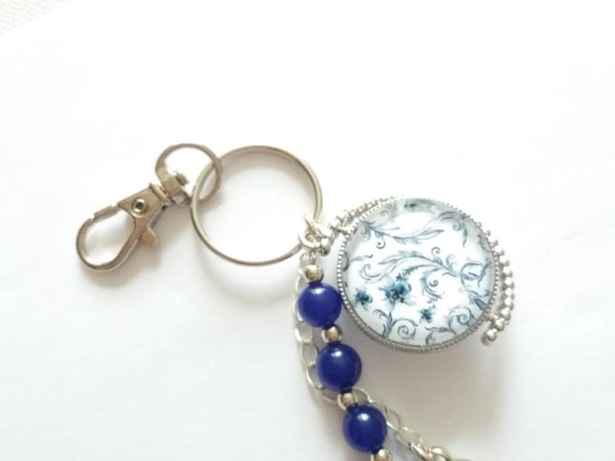 2 Love it Sierbloem - Sleutel-Tashanger - Dubbelzijdig - Blauw - Zilverkleurig - Wit